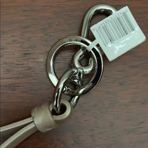 NWT Tumi Tassle Gold Metallic Leather - Picture 2 of 3